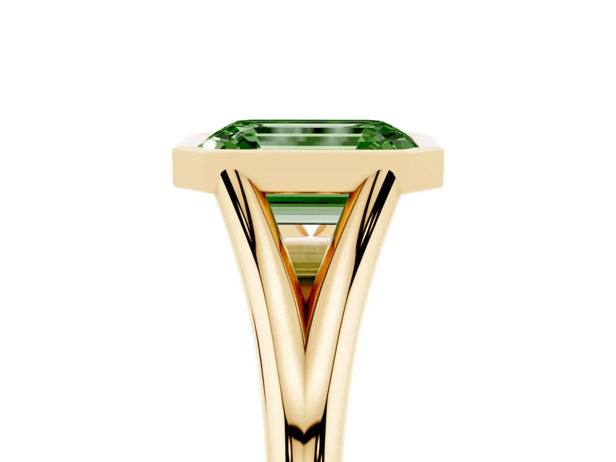 Fancy Green Bezel Set Emerald Cut Cut Solitaire Ring with Tapered Band Yellow gold