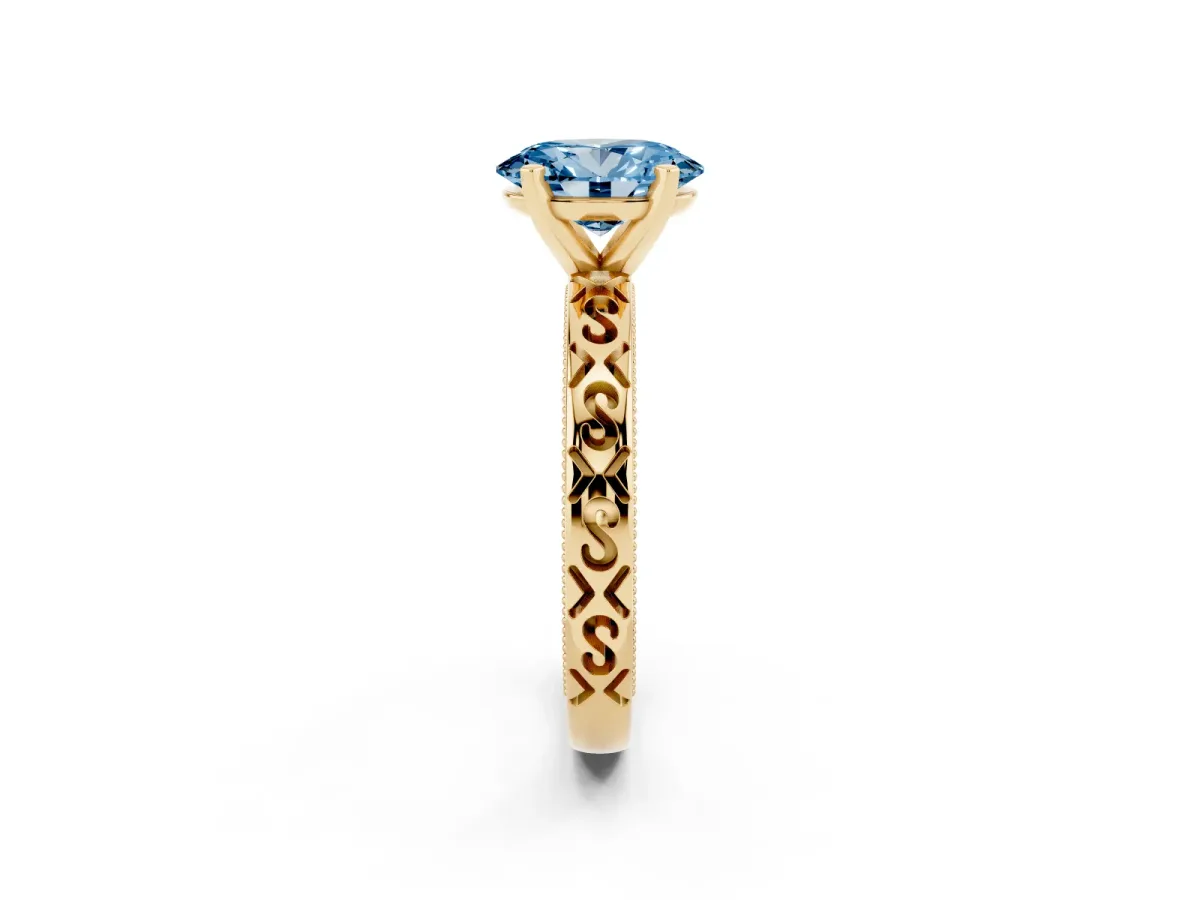 Fancy Blue Oval Cut Solitaire Engagement Ring with Scrollwork Band and Four-Prong Setting Yellow gold