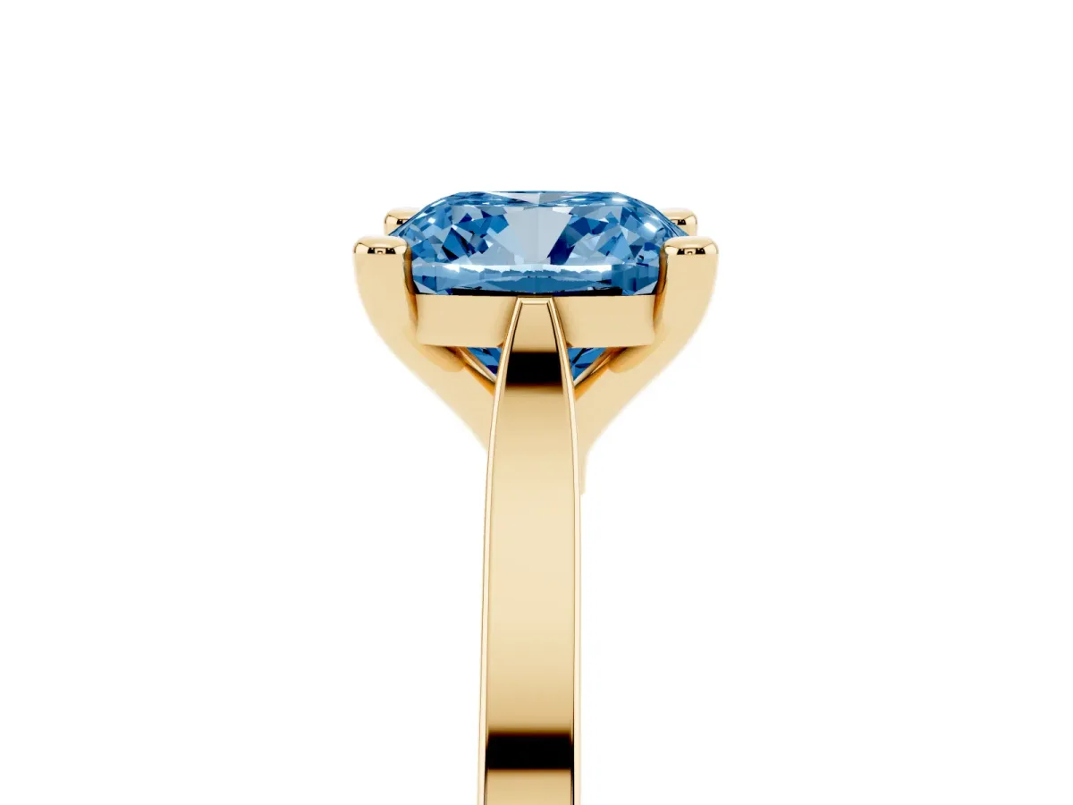 Fancy Blue Cushion Cut Solitaire Diamond Ring with Four-Prong Setting and Tapered Band Yellow gold