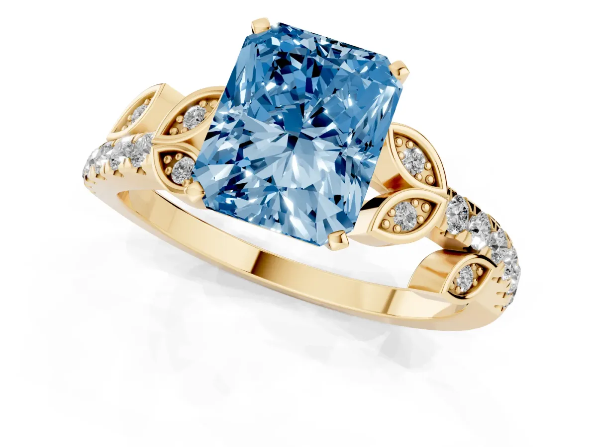 Fancy Blue Radiant Cut Solitaire Leaf-Inspired Diamond Ring with Pavé Band and Four-Prong Setting Yellow gold