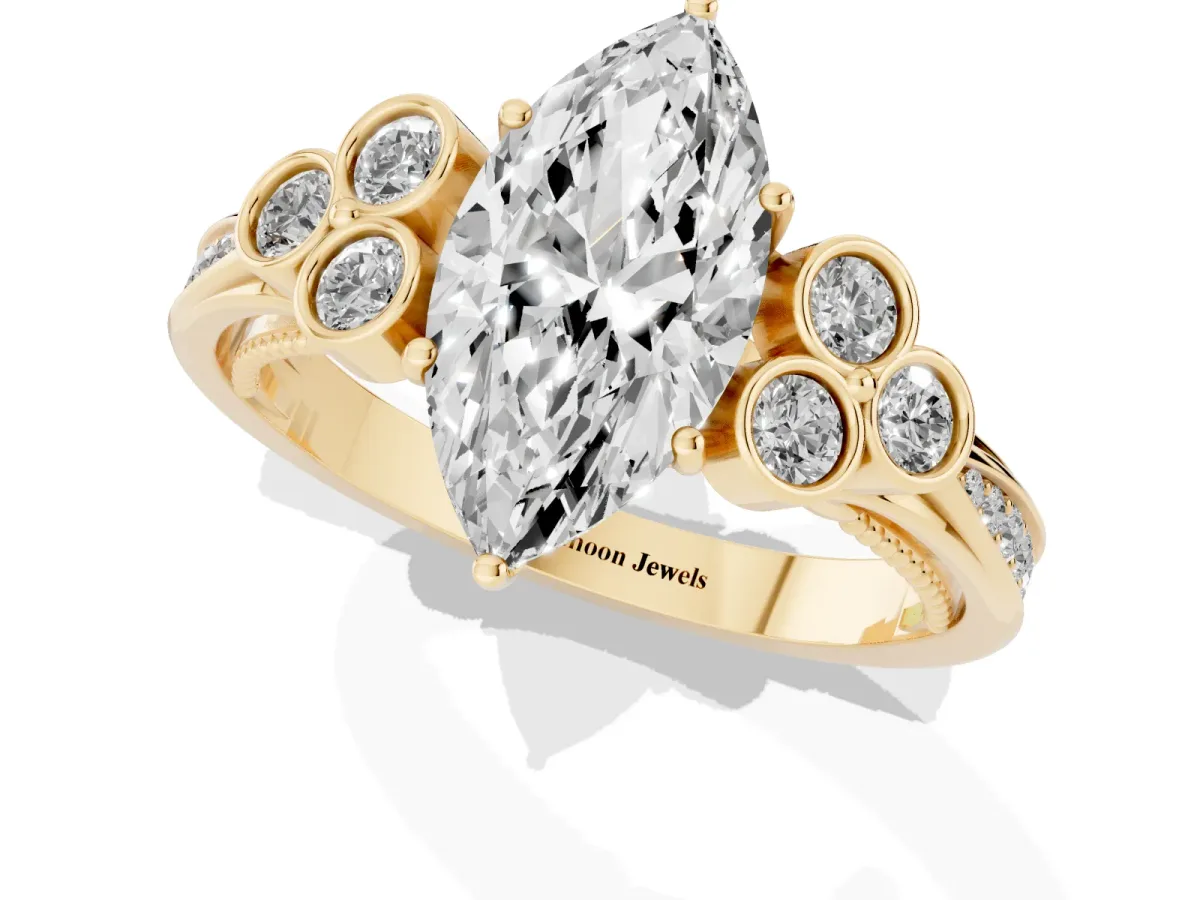 Marquise Cut Cut Diamond Engagement Ring with Bezel Set Round Side Stones and Prong Setting Yellow gold