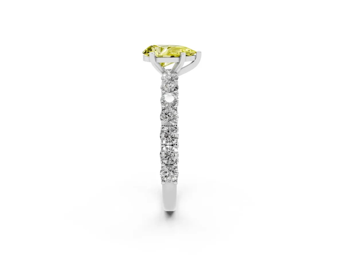 Fancy Yellow Pear Cut Diamond Solitaire Ring with Shared Prong Pavé Band and Four-Prong Setting Silver