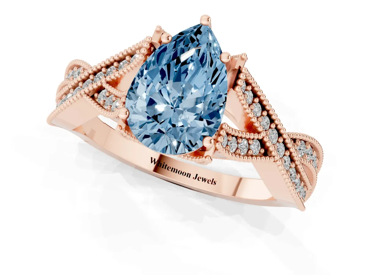 Fancy Blue Pear Cut Cut Diamond Twisted Band with Milgrain Pave Setting and Four-Prong Setting Rose gold
