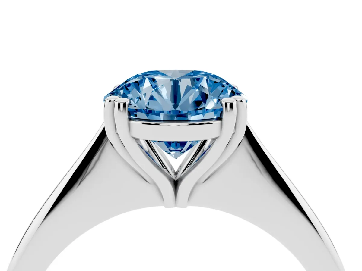 Fancy Blue Round Cut Solitaire Diamond Ring with Six-Prong Setting and Classic Band Silver