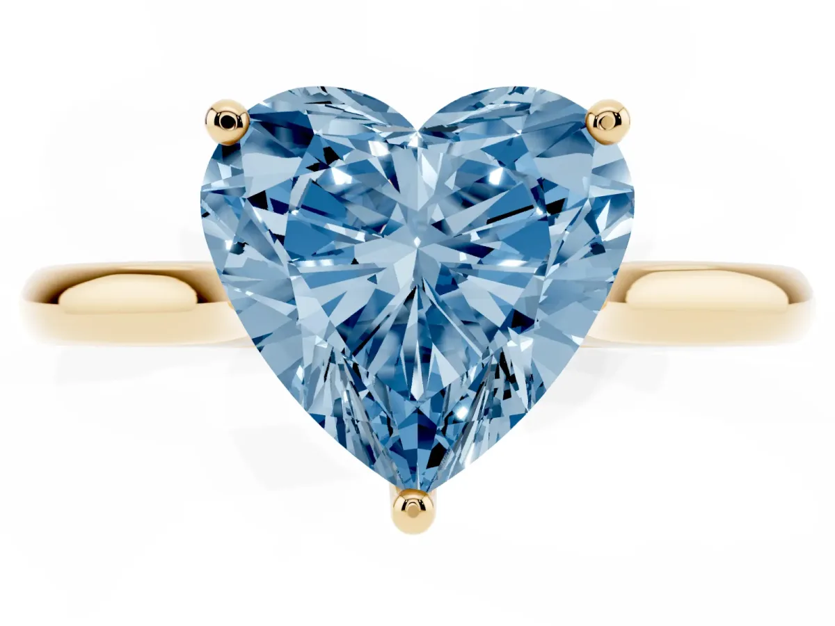 Fancy Blue Heart Cut Cut Solitaire Ring with Cathedral Band and Four-Prong Setting Yellow gold