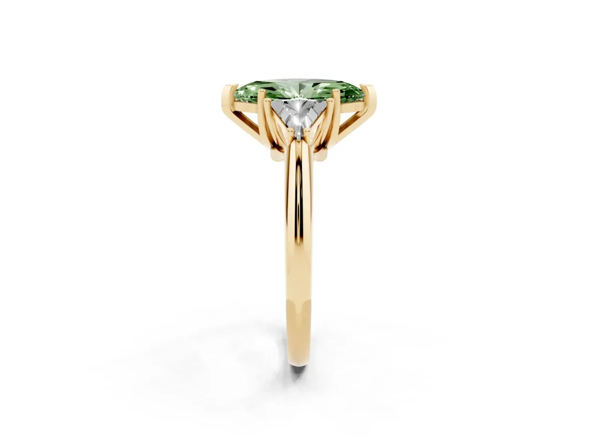 Fancy Green Three-Stone Marquise Cut Diamond Engagement Ring with Trillion Side Stones and Prong Setting Yellow gold