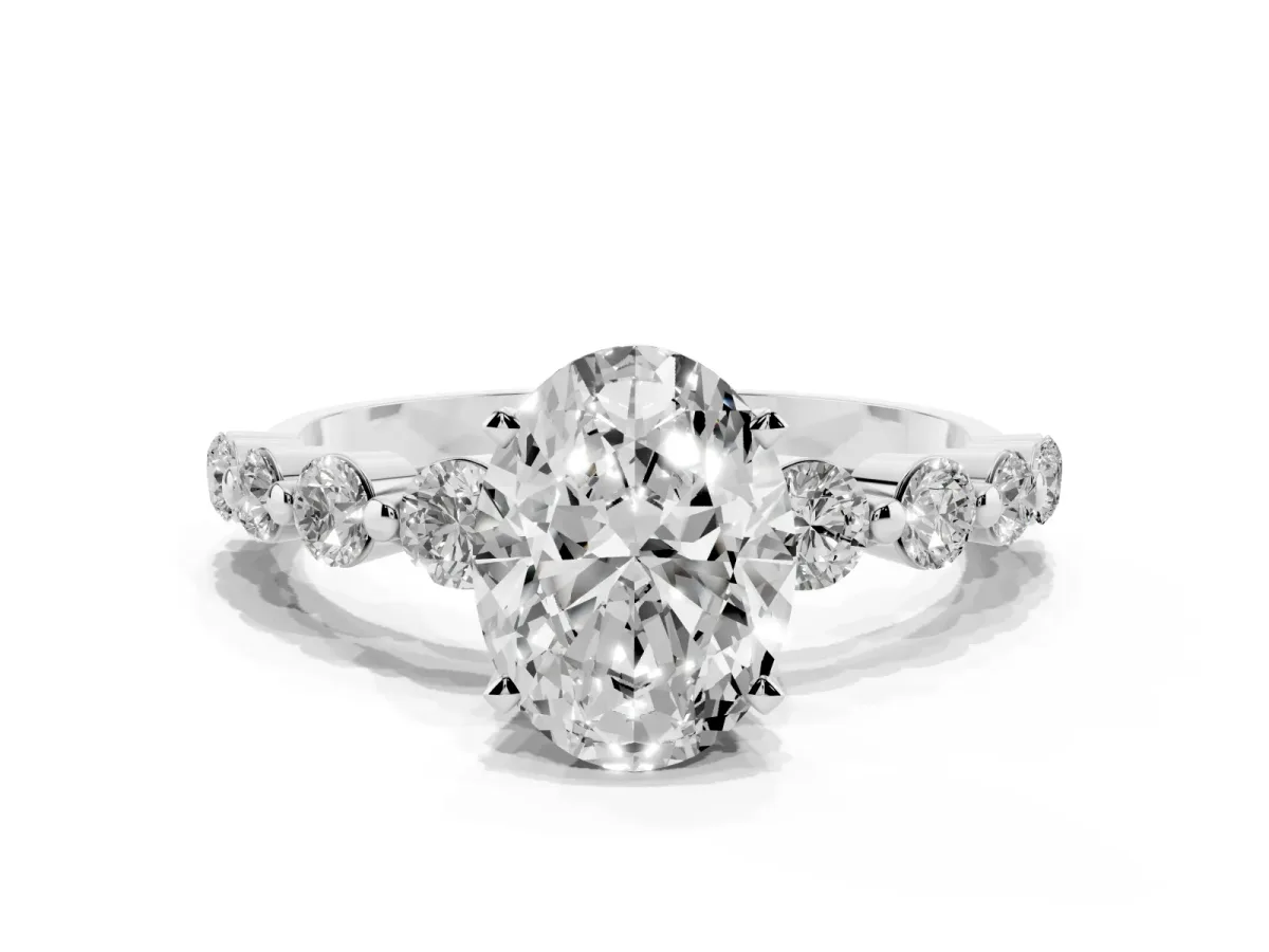 Oval Cut Solitaire Diamond Ring with Pave Band and Four-Prong Setting Silver