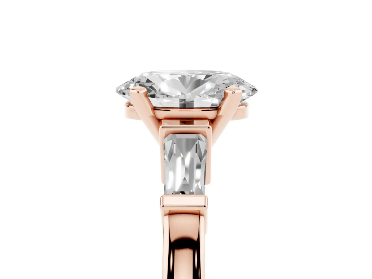 Oval Cut Cut Diamond Solitaire Ring with Tapered Baguette Accents and Four-Prong Setting Rose gold