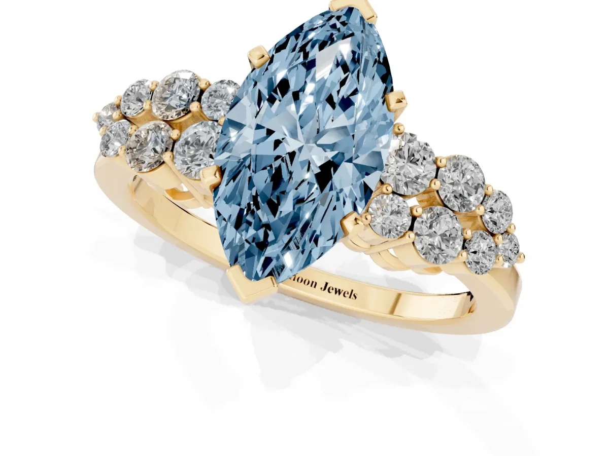 Fancy Blue Marquise Cut Cluster Diamond Engagement Ring with Pavé Band and Four-Prong Setting Yellow gold