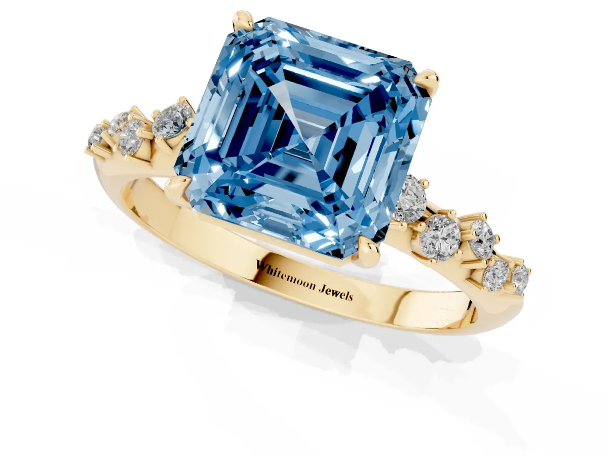 Fancy Blue Asscher Cut Diamond Cluster Side Stone Solitaire Ring with Prong Setting Yellow gold