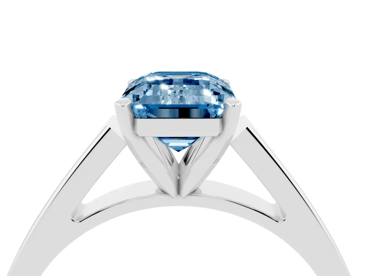 Fancy Blue Emerald Cut Solitaire Engagement Ring with Four-Prong Setting and Tapered Band Silver