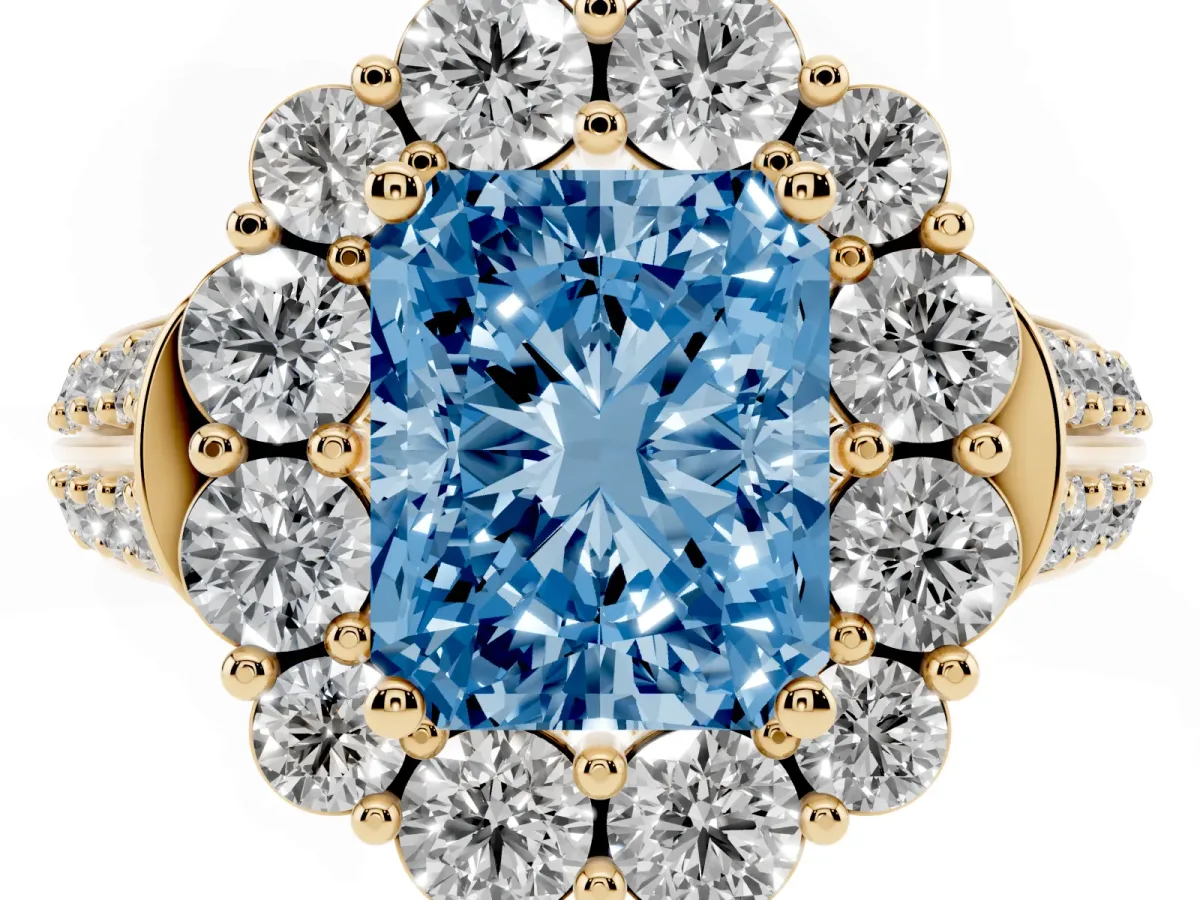 Fancy Blue Radiant Cut Halo Diamond Engagement Ring with Split Shank and Prong Setting Yellow gold