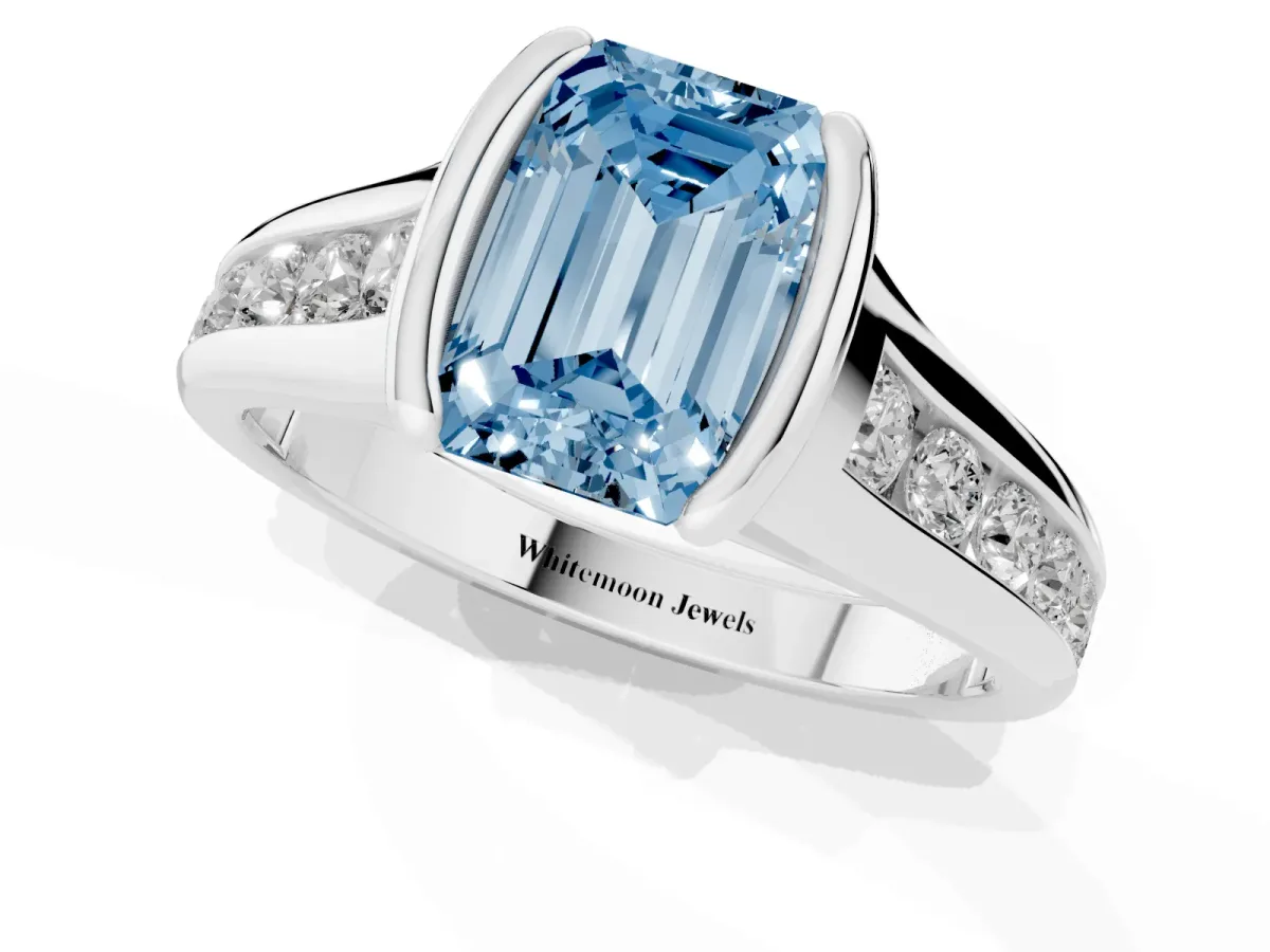 Fancy Blue Emerald Cut Solitaire Bezel-Set Diamond Ring with Channel-Set Band Platinum