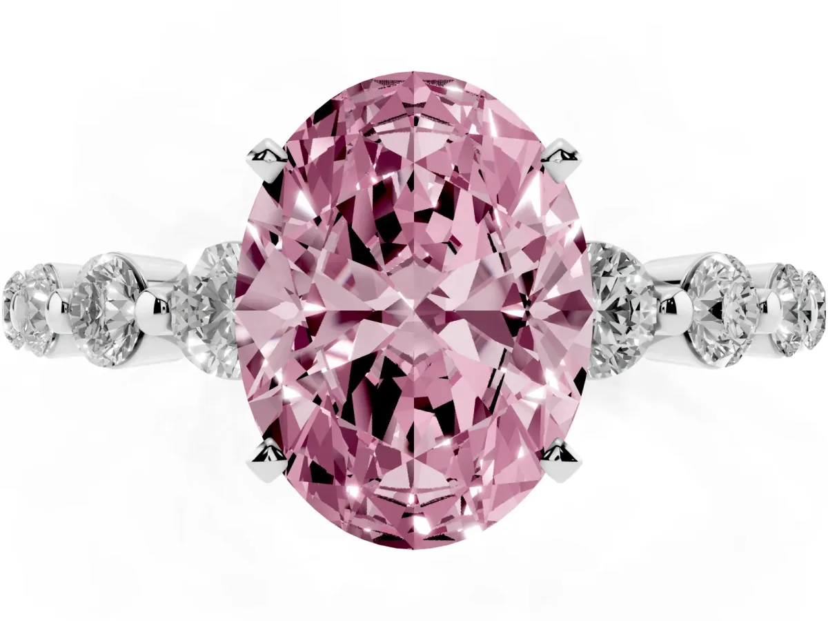 Fancy Pink Oval Cut Solitaire Diamond Ring with Pave Band and Four-Prong Setting Silver