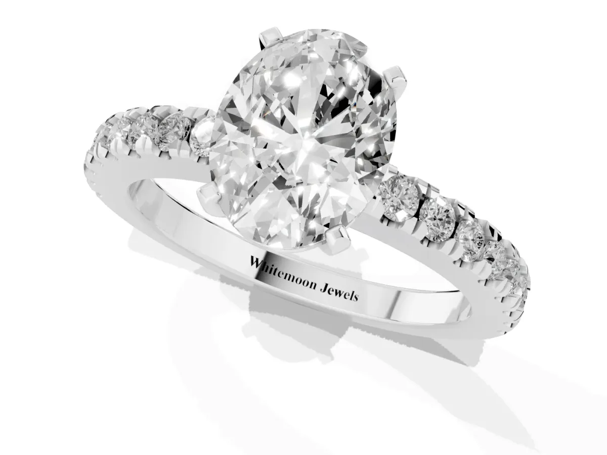 Oval Cut Solitaire Diamond with Pavé Band and Four-Prong Setting Platinum
