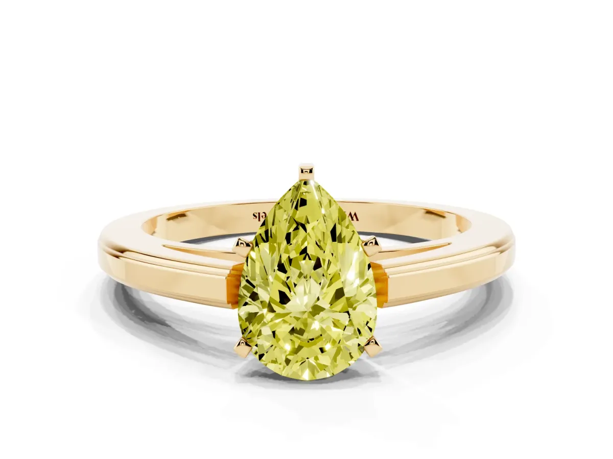 Fancy Yellow Pear Cut Solitaire Diamond Ring with Four-Prong Setting and Classic Band Yellow gold