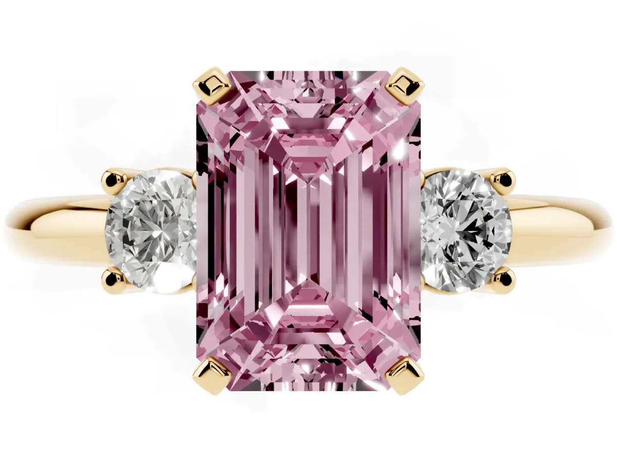 Fancy Pink Three-Stone Emerald Cut Cut Diamond Solitaire with Prong Setting and Classic Band Yellow gold