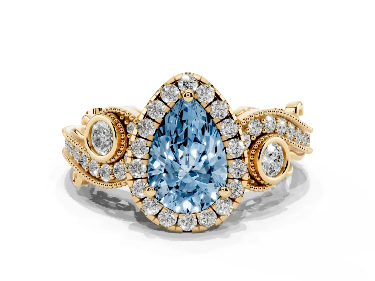 Fancy Blue Pear Cut Halo Diamond Ring with Milgrain and Bezel Accents on a Split Shank Band Yellow gold