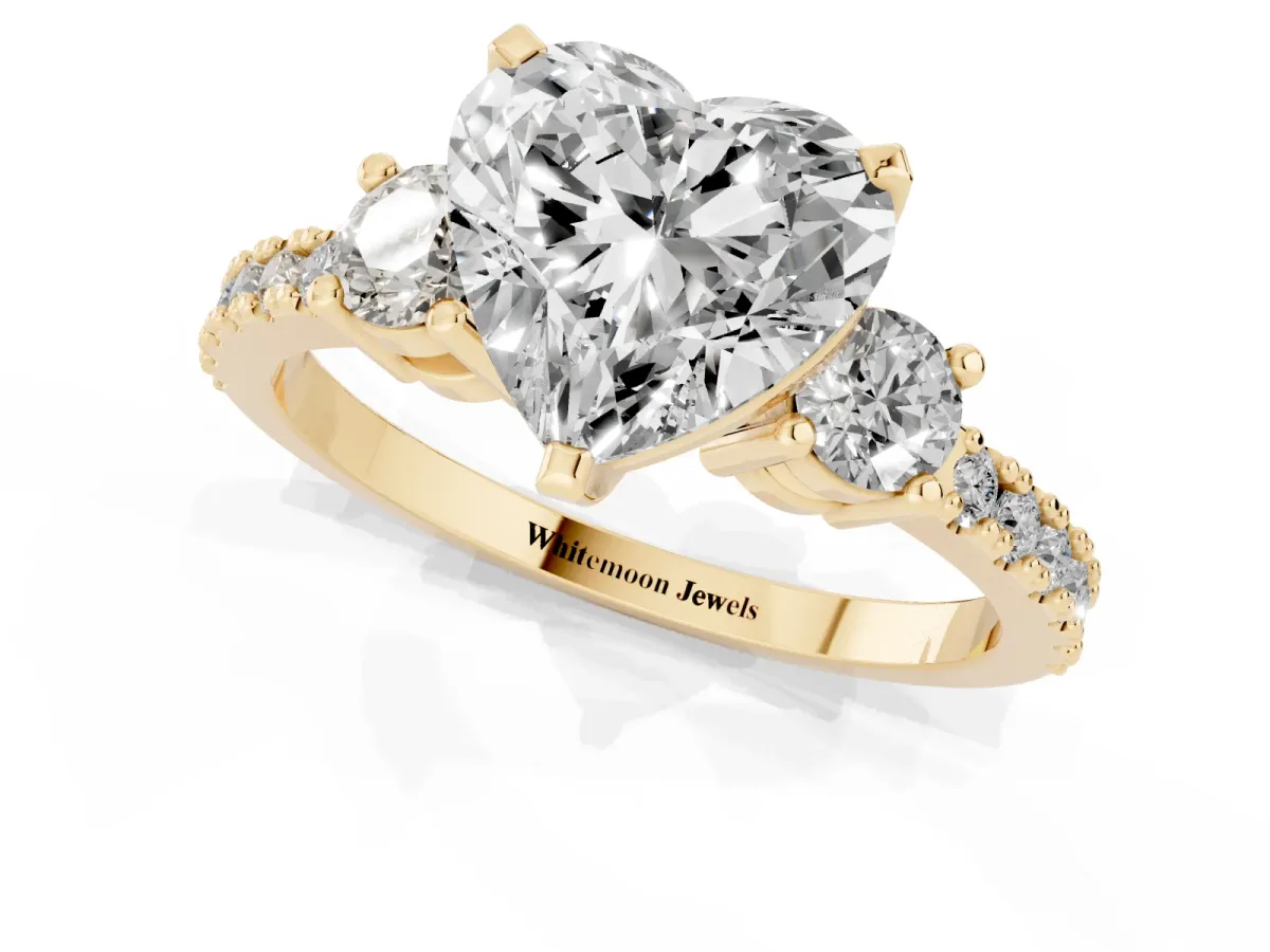 Heart Cut Three-Stone Diamond Pavé Band with Prong Setting Yellow gold