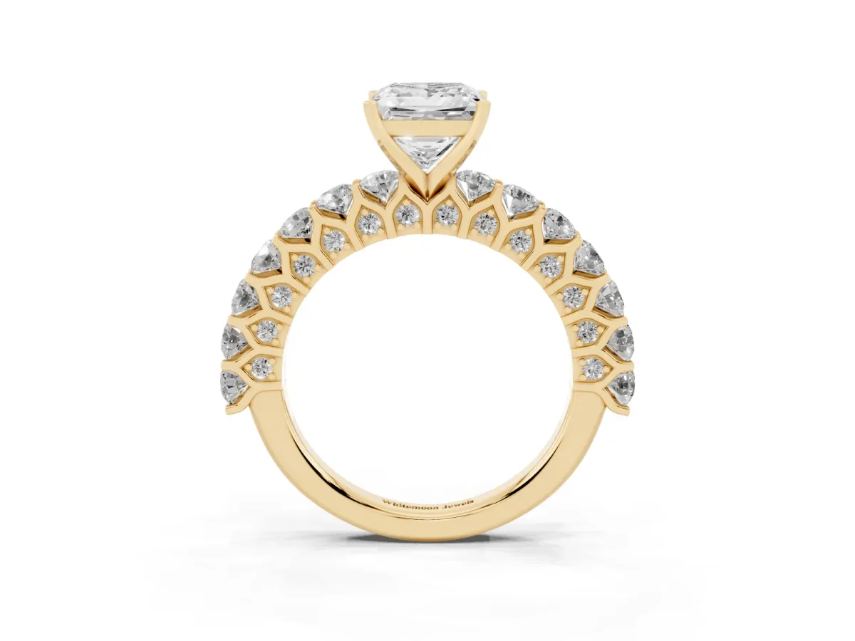Princess Cut Diamond Solitaire Ring with Shared Prong Pavé Band and Four-Prong Setting Yellow gold