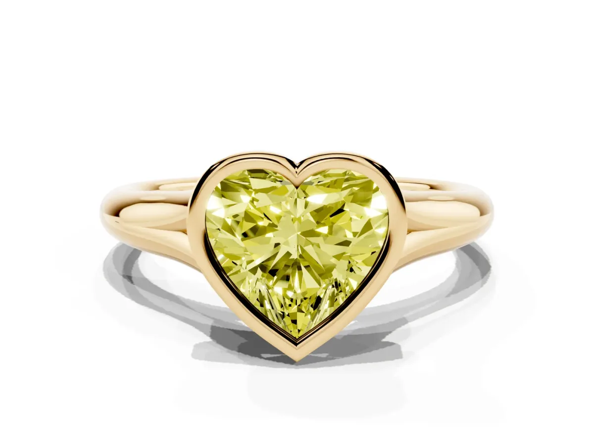 Fancy Yellow Bezel Set Heart Cut Solitaire Diamond Ring with Smooth Band Yellow gold
