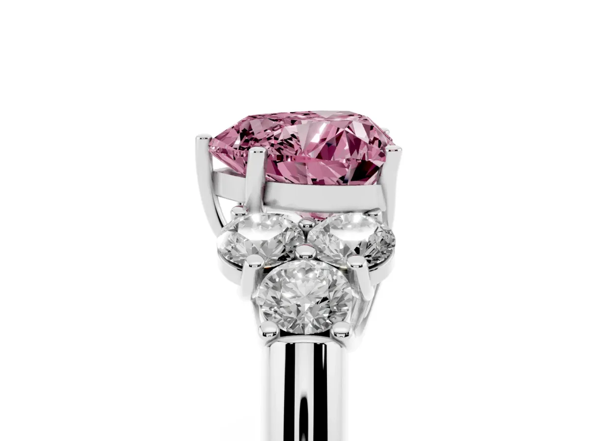 Fancy Pink Heart Cut Cut Diamond Cluster Ring with Round Accent Stones and Prong Setting on a Classic Band White gold