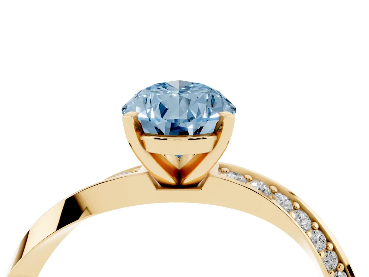 Fancy Blue Pear Cut Diamond Engagement Ring with Side Stone Accents and Four-Prong Setting Yellow gold