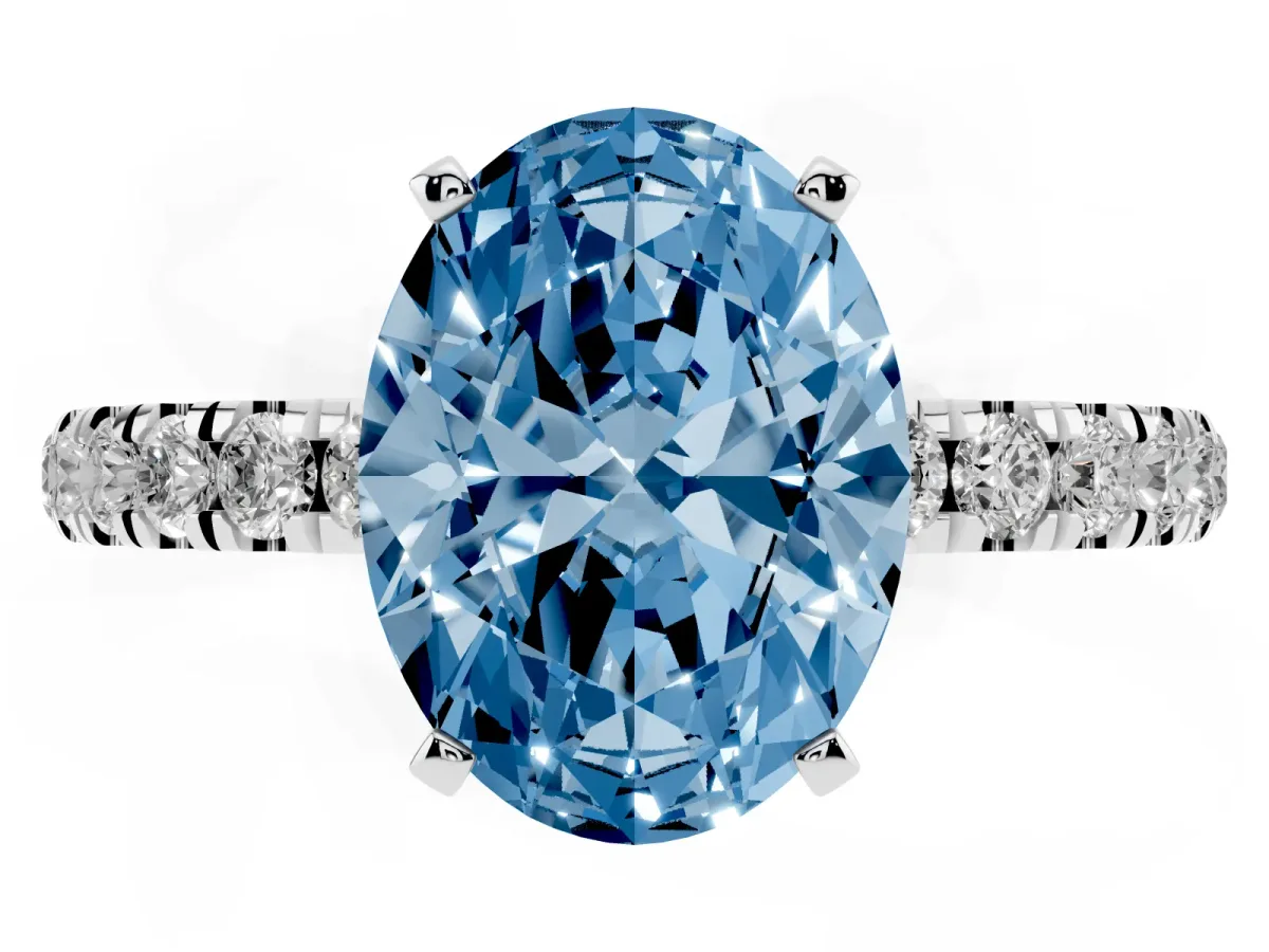 Fancy Blue Oval Cut Diamond Solitaire Ring with Pavé Accents and Four-Prong Setting Silver
