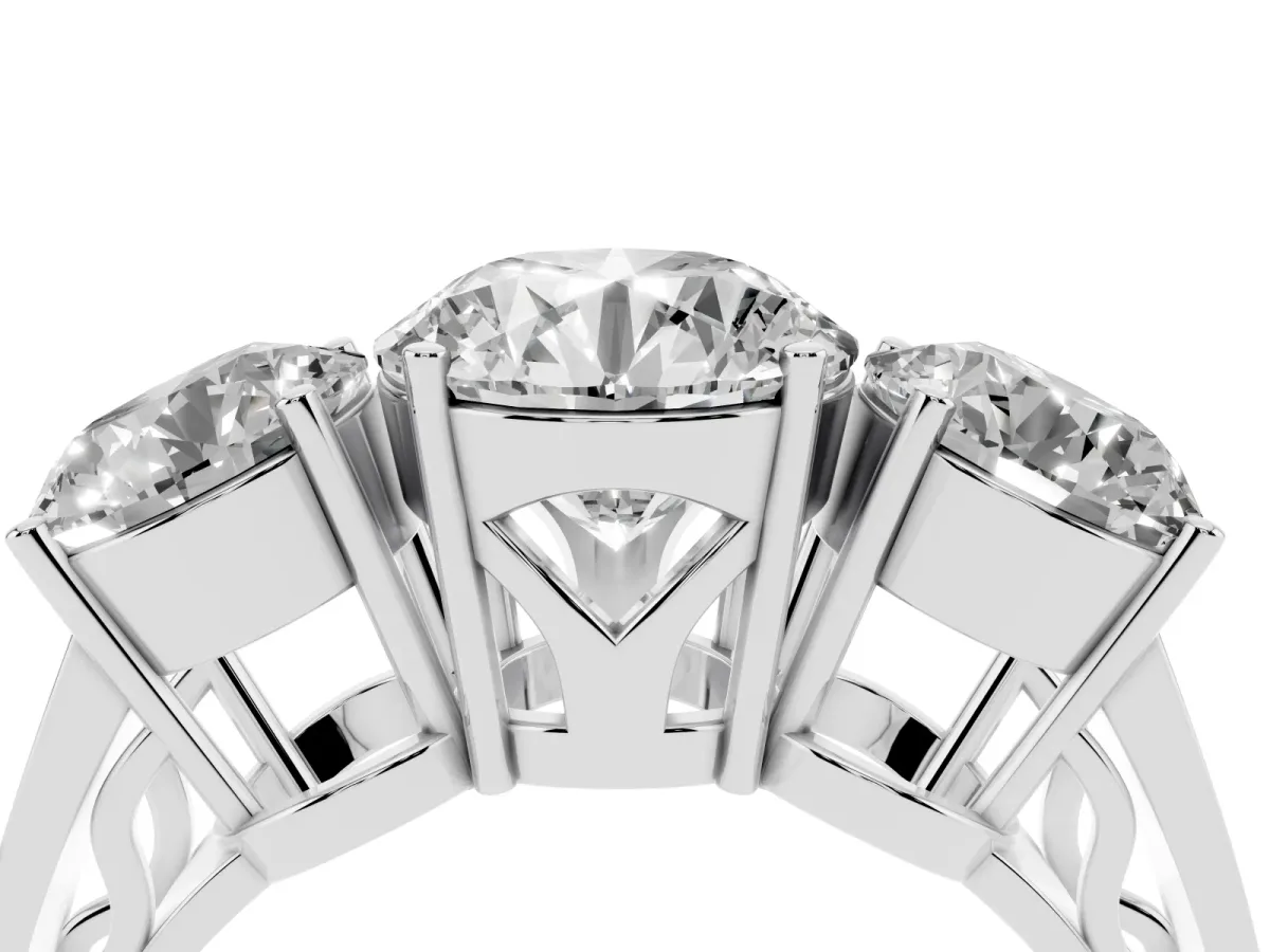 Round Cut Diamond Three-Stone Ring with Prong Setting and Textured Band Silver
