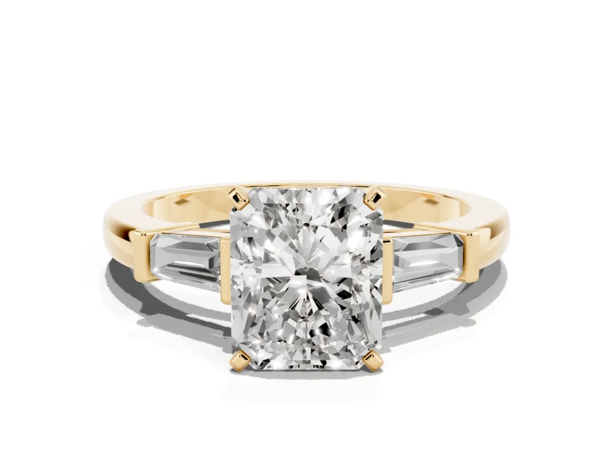 Radiant Cut Cut Diamond Solitaire Ring with Tapered Baguette Accents and Four-Prong Setting Yellow gold