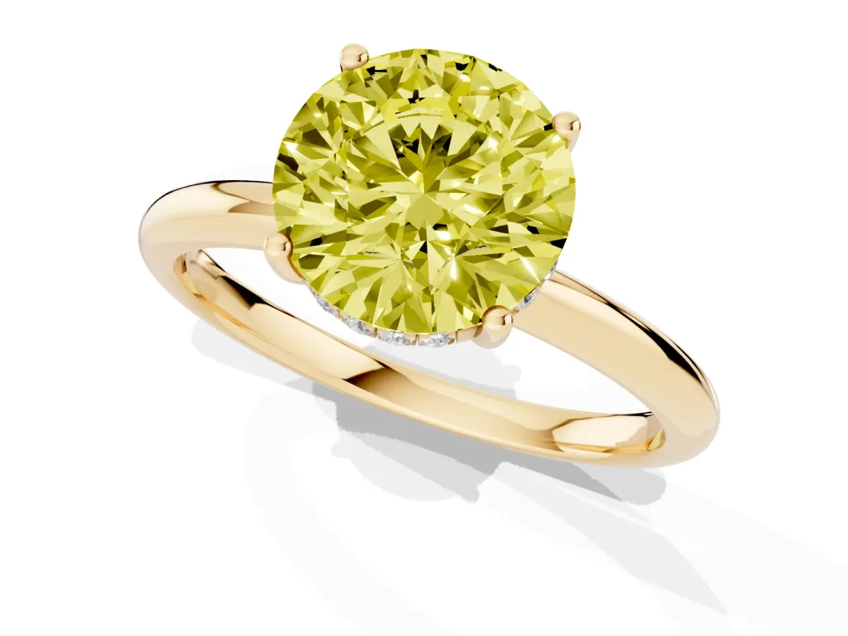 Fancy Yellow Round Cut Cut Solitaire Engagement Ring with Four-Prong Setting and Classic Band Yellow gold