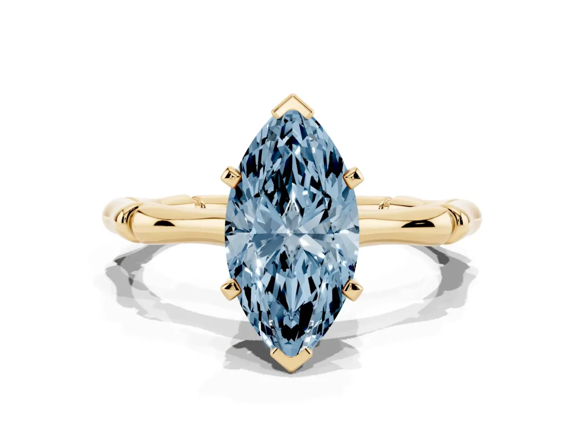 Fancy Blue Marquise Cut Solitaire Diamond Ring with Bamboo Band and Four-Prong Setting Yellow gold