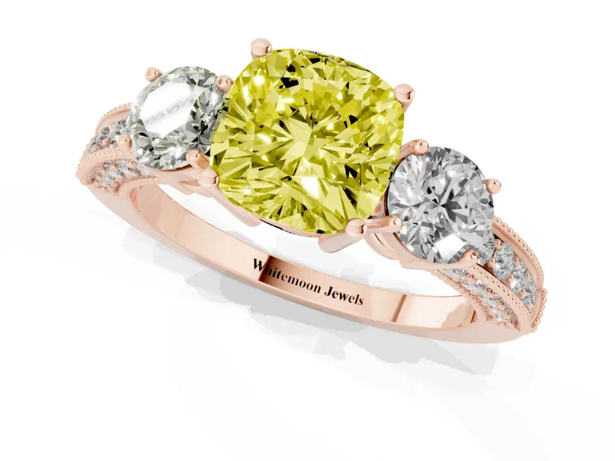 Fancy Yellow Cushion Cut Three-Stone Diamond Ring with Pavé Band and Four-Prong Setting Rose gold