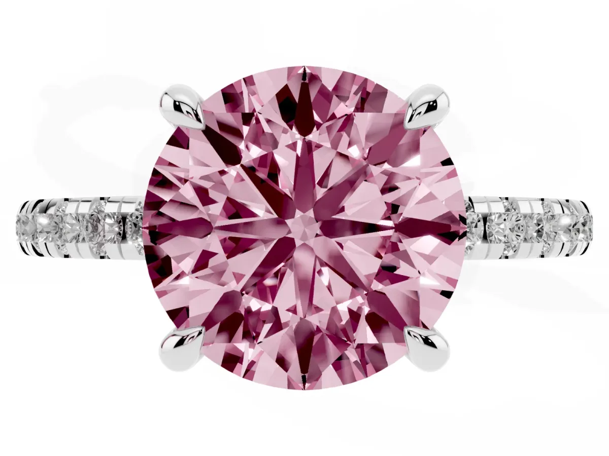 Fancy Pink Round Cut Diamond Brilliant Solitaire Ring with Pavé Band and Four-Prong Setting Silver