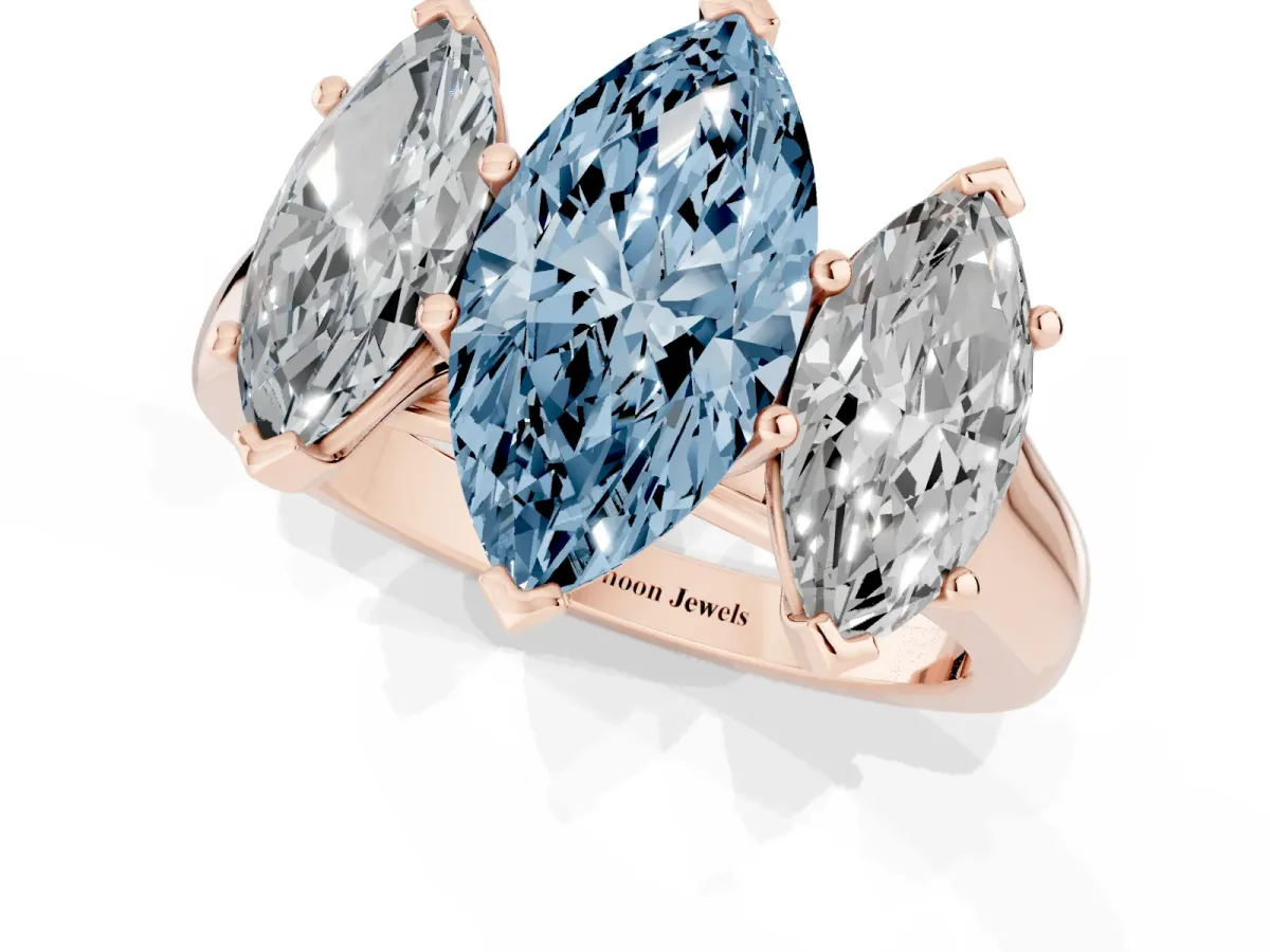 Fancy Blue Marquise Cut Three-Stone Diamond Ring with Prong Setting on a Classic Band Rose gold