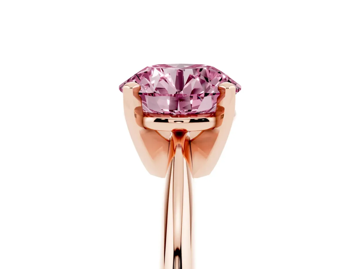 Fancy Pink Round Cut Cut Solitaire Ring with Four-Prong Setting on a Classic Band Rose gold