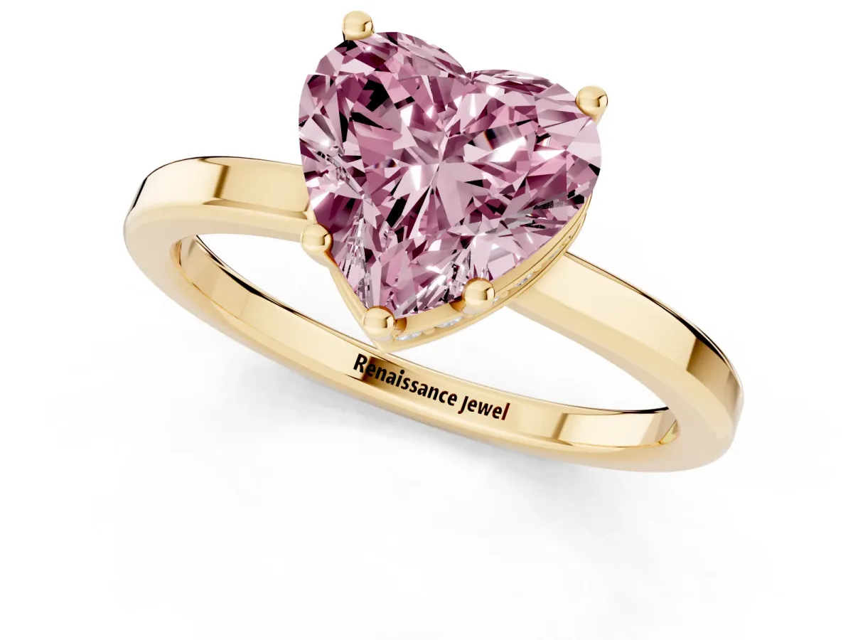 Fancy Pink Heart Cut Cut Solitaire Engagement Ring with Four-Prong Setting on a Classic Band Yellow gold