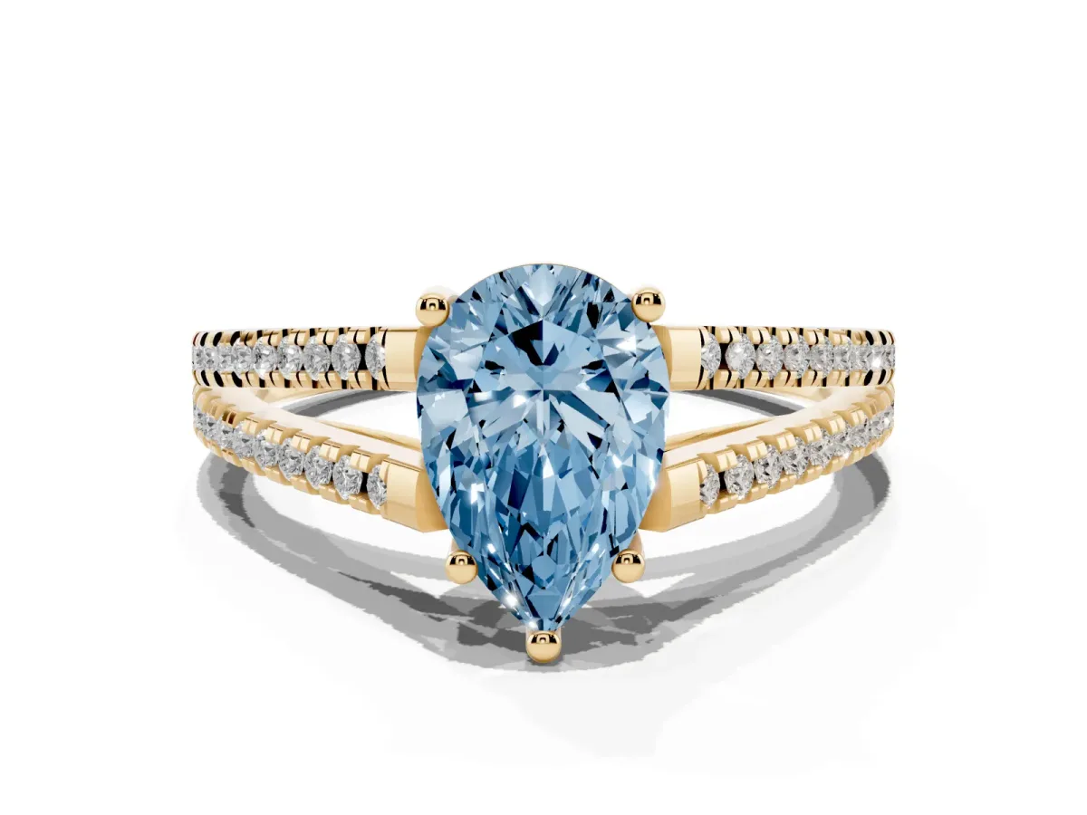 Fancy Blue Pear Cut Diamond Solitaire Engagement Ring with Split Shank Pavé Band Yellow gold