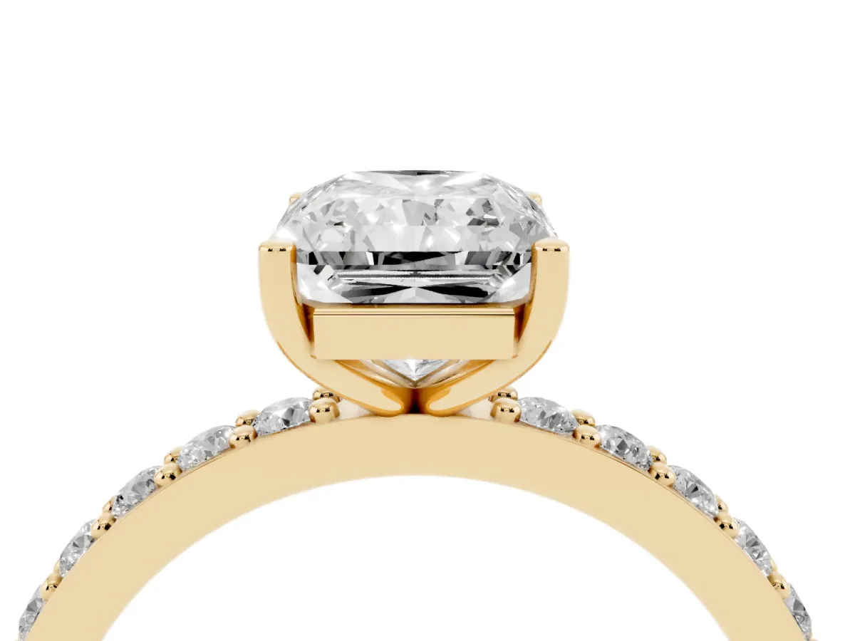 Radiant Cut Cut Diamond Solitaire with Pave Band and Four-Prong Setting Yellow gold