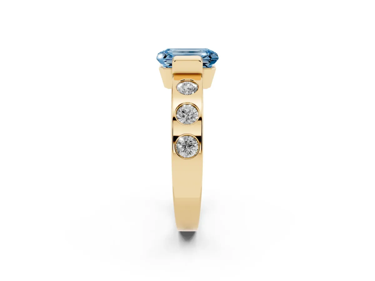 Fancy Blue Emerald Cut Brilliant Channel-Set Diamond Ring with Bezel Prong Setting Yellow gold