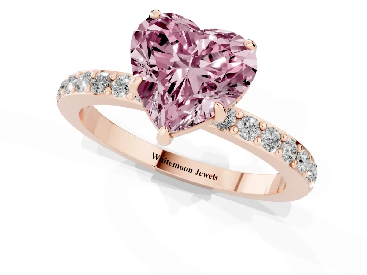 Fancy Pink Heart Cut Diamond Pavé Engagement Ring with Round Accents and Prong Setting Rose gold