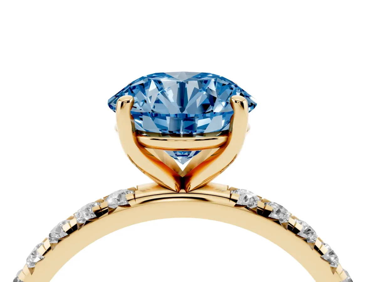 Fancy Blue Round Cut Cut Diamond Solitaire Ring with Micro Pave Band and Four Prong Setting Yellow gold