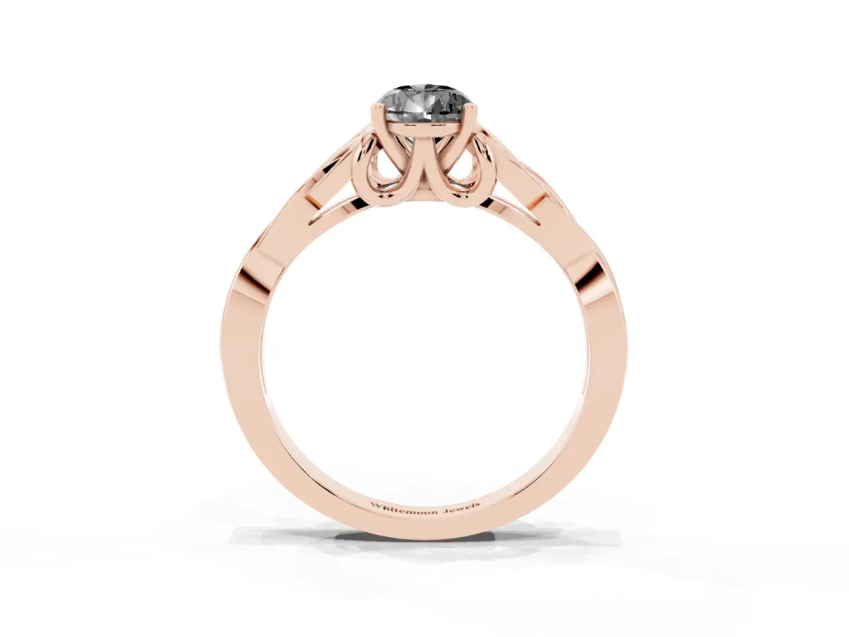 Fancy Black Pear Cut Diamond Solitaire Engagement Ring with Celtic Knot Band and Four-Prong Setting Rose gold