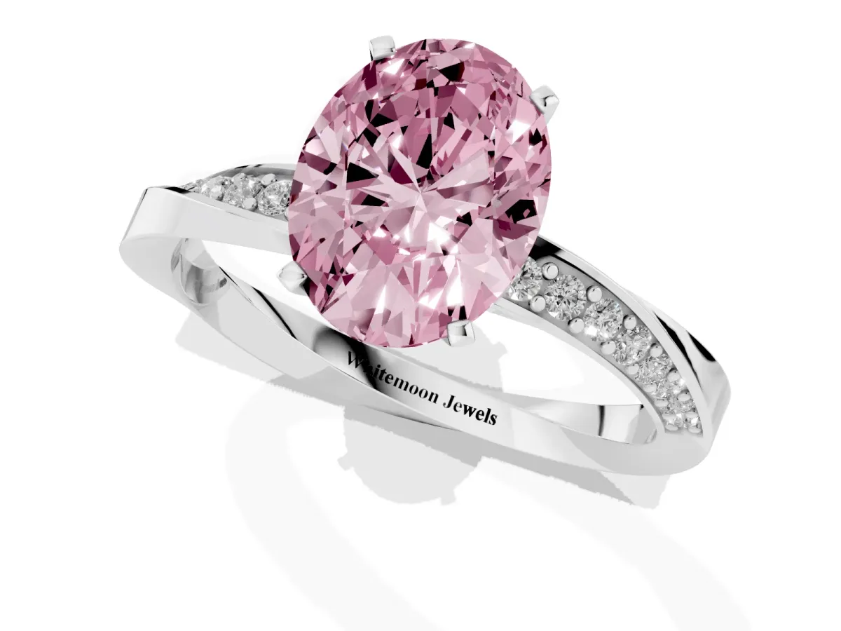 Fancy Pink Oval Cut Diamond Engagement Ring with Side Stone Accents and Four-Prong Setting Silver