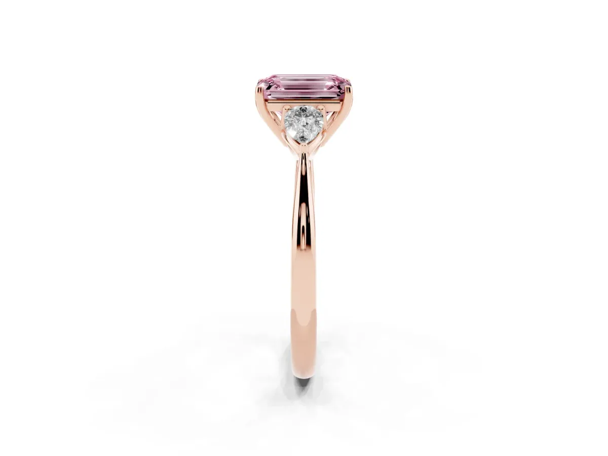 Fancy Pink Three-Stone Emerald Cut Diamond Ring with Pear Side Stones in Four-Prong Setting Rose gold