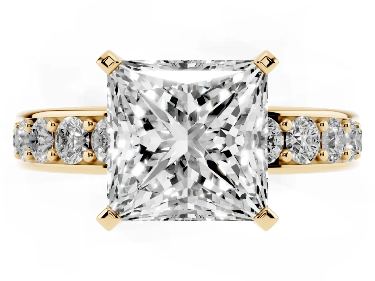 Princess Cut Diamond Engagement Ring with Channel Set Round Band and Prong Setting Yellow gold