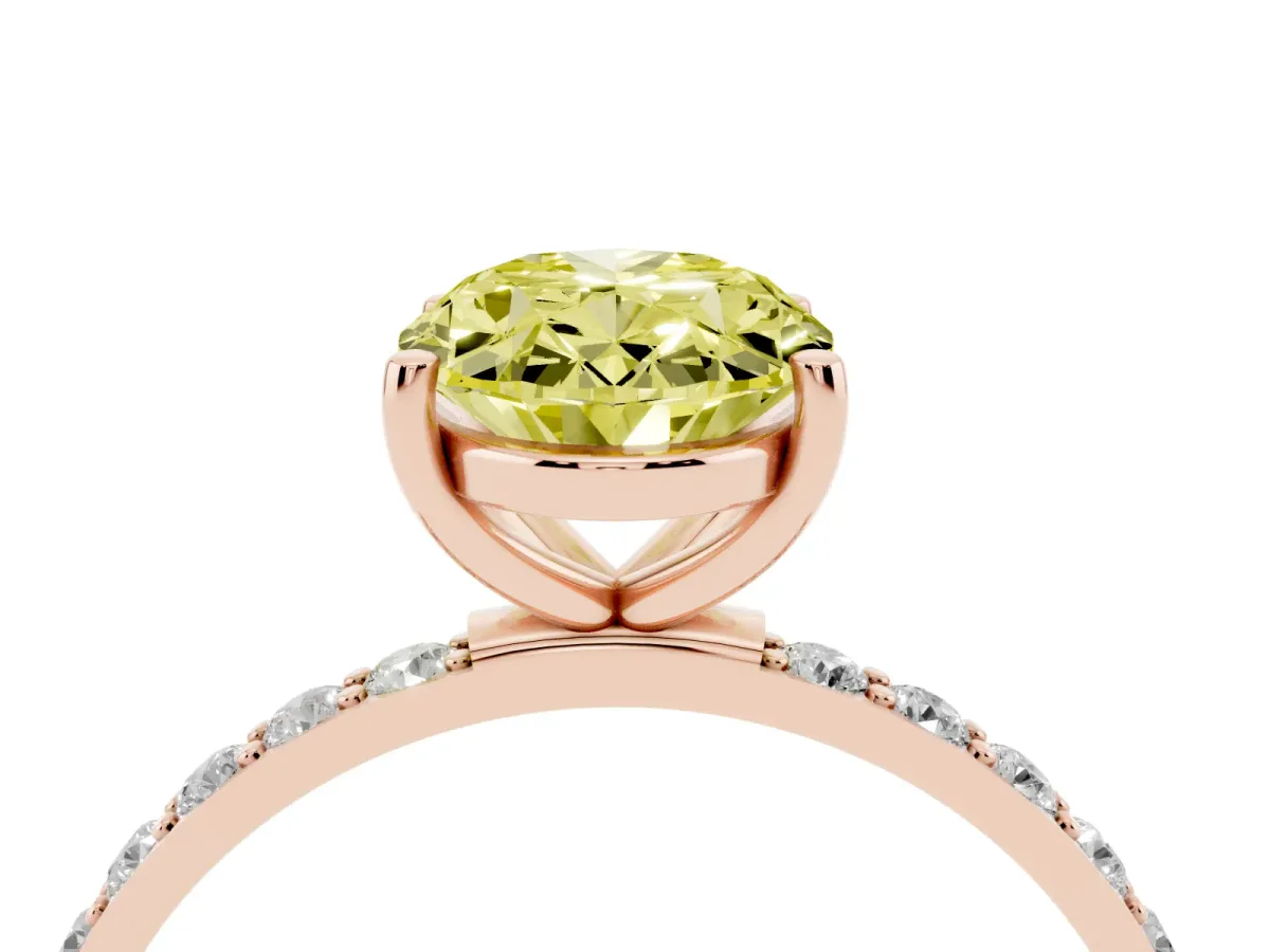 Fancy Yellow Oval Cut Diamond Solitaire Ring with Round Pavé Shoulders and Prong Setting Rose gold
