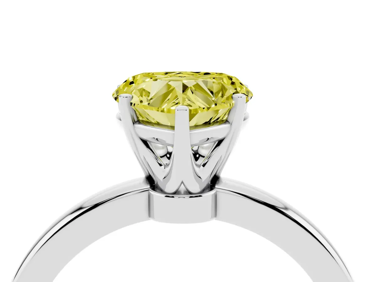 Fancy Yellow Heart Cut Solitaire Diamond Ring with Six-Prong Setting on a Classic Band Silver