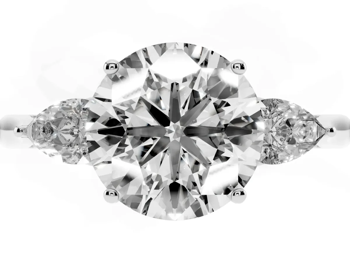 Three-Stone Round Cut Diamond Ring with Pear Side Stones in Four-Prong Setting Silver
