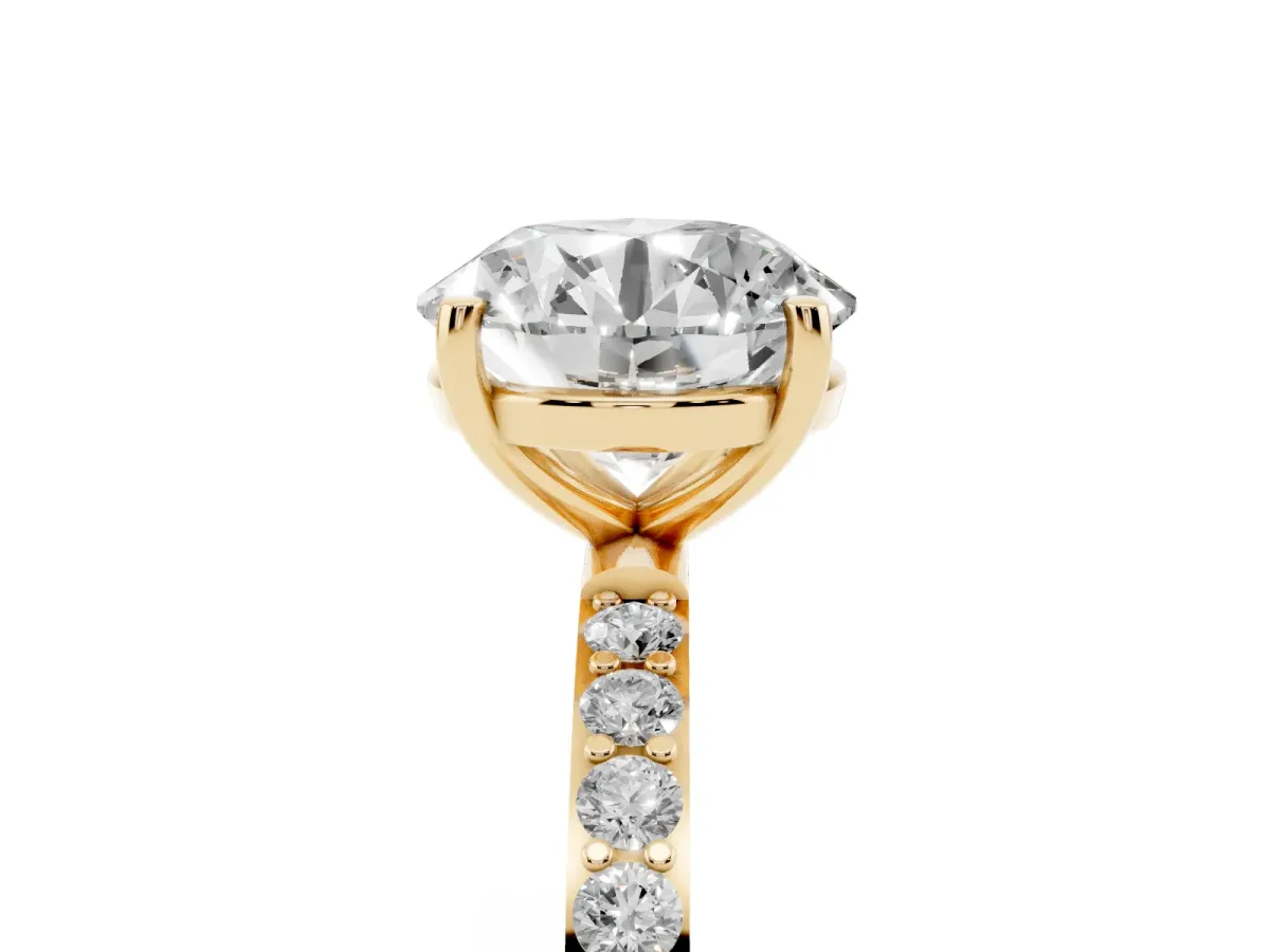 Round Cut Diamond Solitaire Ring with Round Pavé Shoulders and Prong Setting Yellow gold